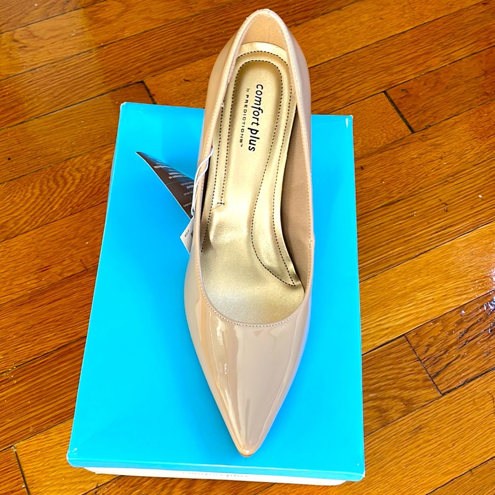 Pointy toe tan heels with glossy finish.